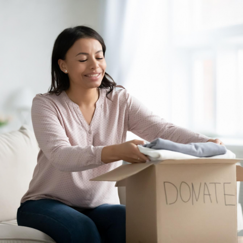 Woman donating clothes