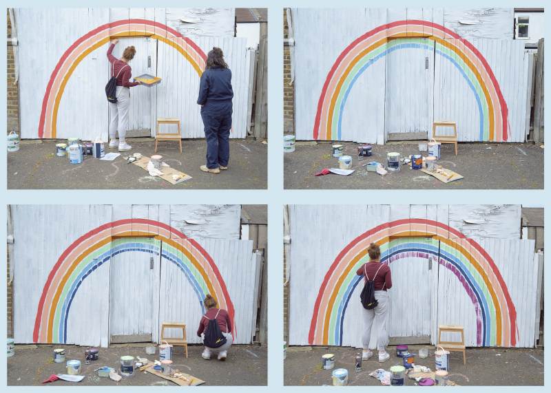 A montage of four images showing two women painting a rainbow onto a whitewashed wooden fence