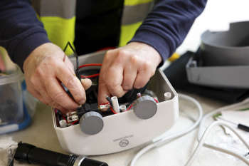 Haringey Fixers volunteer carrying out a repair