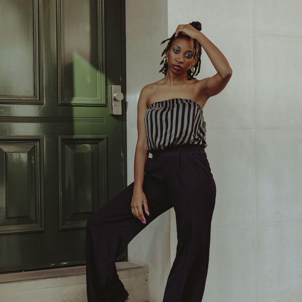 Black trousers and grey and black stripy top