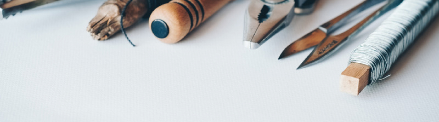 Selection of tools sitting on piece of paper