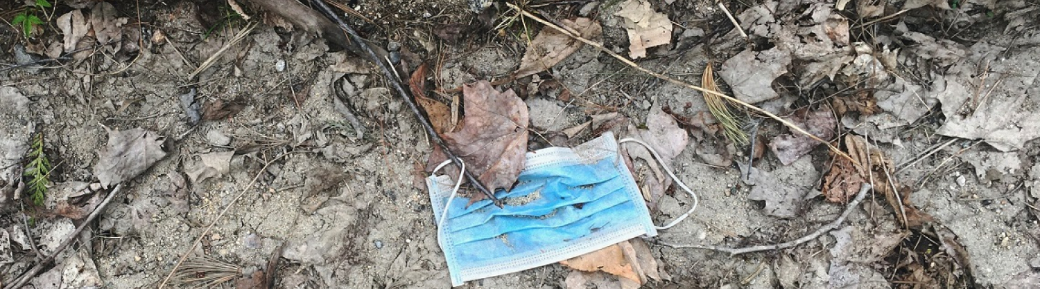 disposable facemask on floor