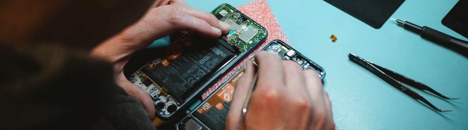 Man repairing smart phone