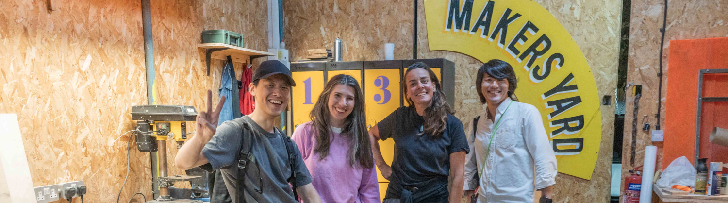 Four people at a plastic joinery workshop