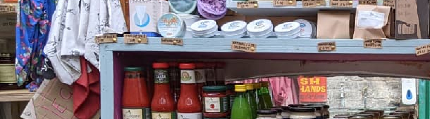 An image of the zero-waste shop- bottles and cans in pic