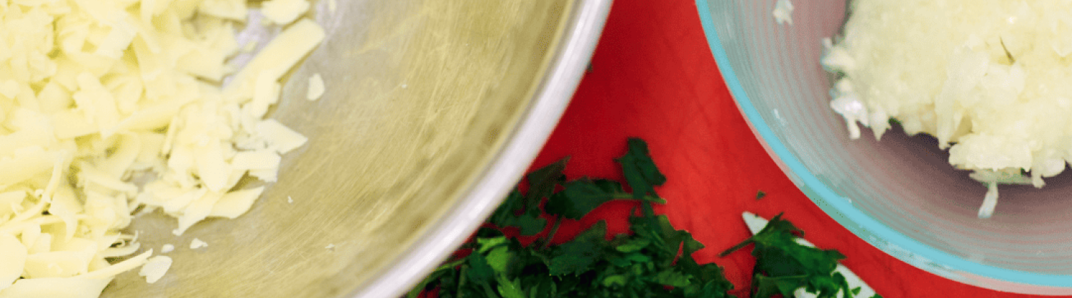 Close up of chopped herbs and vegetables