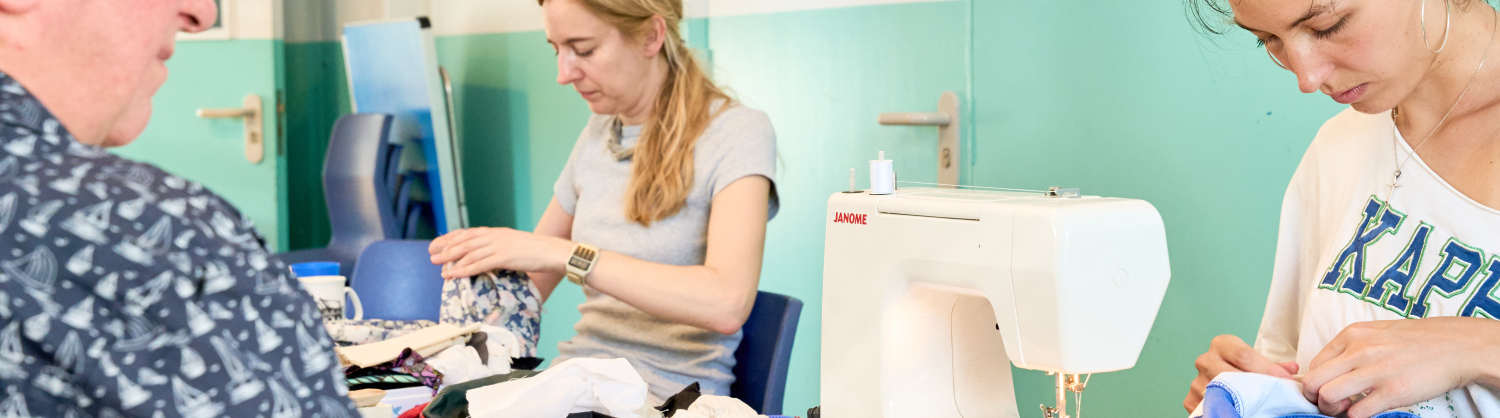 Women repairing clothing