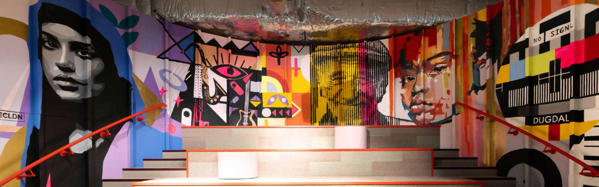 A colourful wall mural at the Dugdale Arts Centre