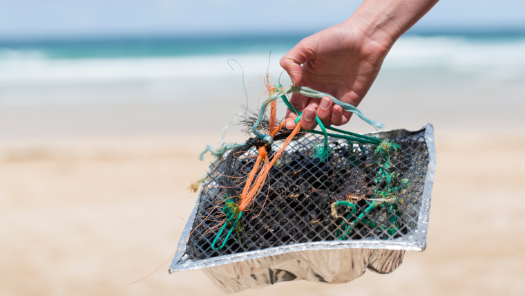 A disposable barbecue dumped in the sea