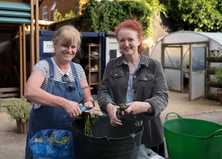 Sarah (right) and her neighbour at the Octopus Community Plant Nursery