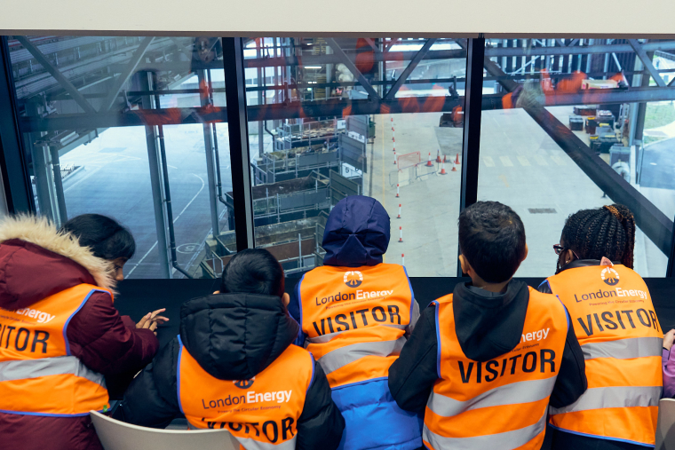 Students in high-vis look at the bunker at Edmonton EcoPark