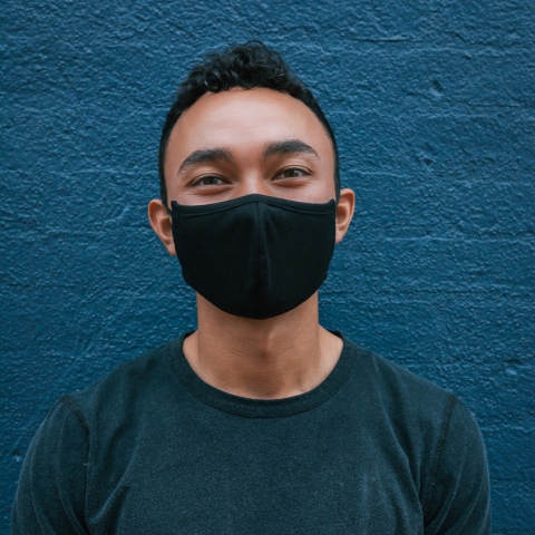 man wearing black face mask