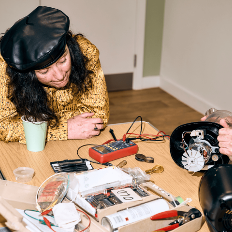 Attendee at one of the repair cafes set up Kilburn Repair Club