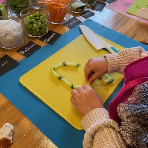 A woman chopping vegetables