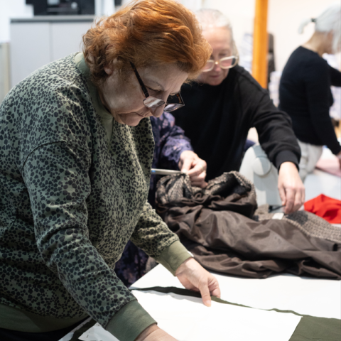 Women repairing clothes