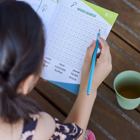 Student completing an activity booklet