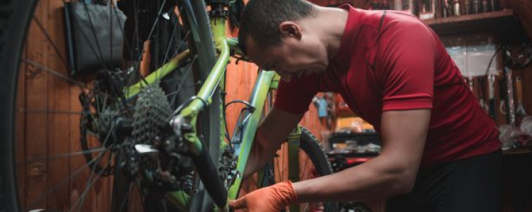 Man repairing bike