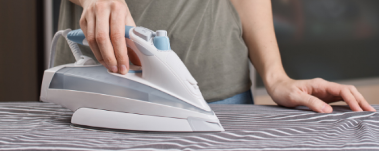 Person ironing a shirt 