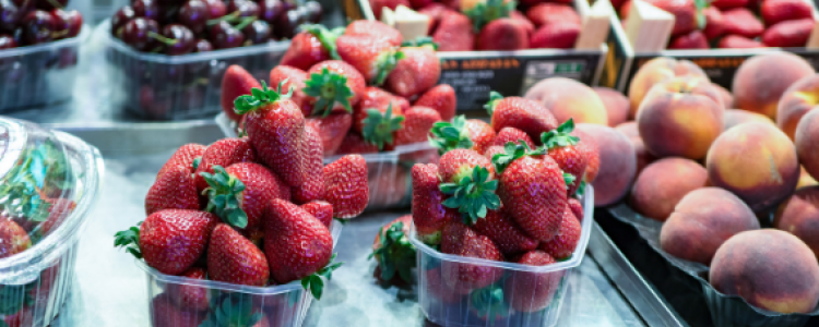 strawberries, cherries and peaches in punnets,  