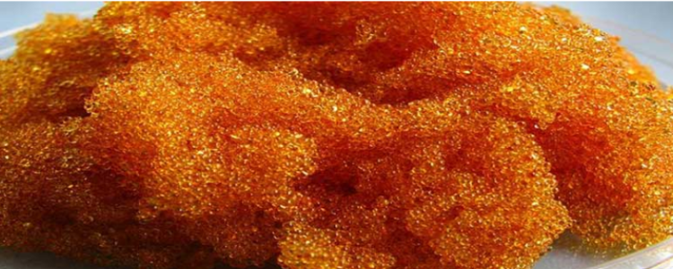 A pile of used water softener resin