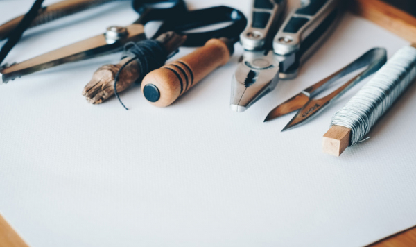 Selection of tools sitting on piece of paper