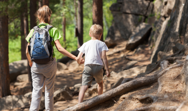 children walking in forest