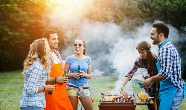 Group gathered around a barbecue 