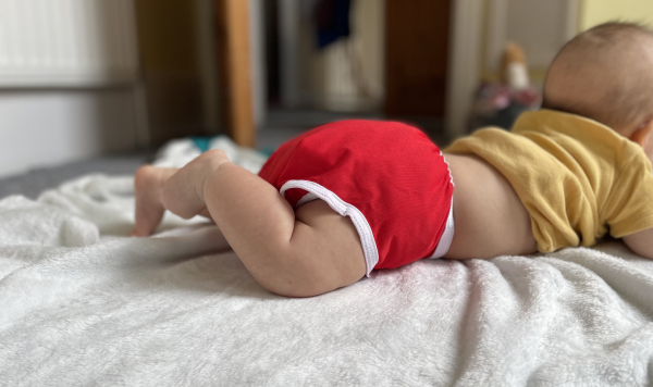 Baby in reusable nappy